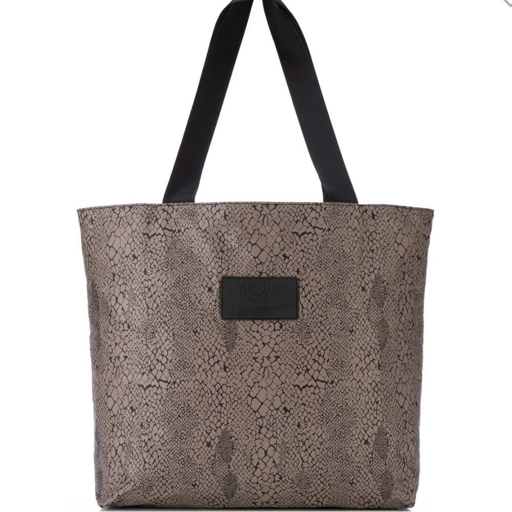 Brand new Aloha Collection Python Day Tripper bag